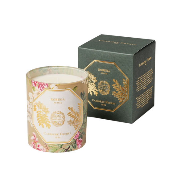 Acacia (Robinia) candle by Carrière Frères—shown in front of its illustrated botanical box. Available at Michelle Kindness Design.