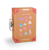 The Back view of La Petite Armoire from Moulin Roty’s La Grande Famille—closed suitcase featuring soft vintage-style illustration & carry handles, available at Michelle Kindness Design.