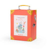 Front view of La Petite Armoire de Nini from Moulin Roty’s La Grande Famille—closed suitcase with pastel floral pattern & carry handles, available at Michelle Kindness Design.